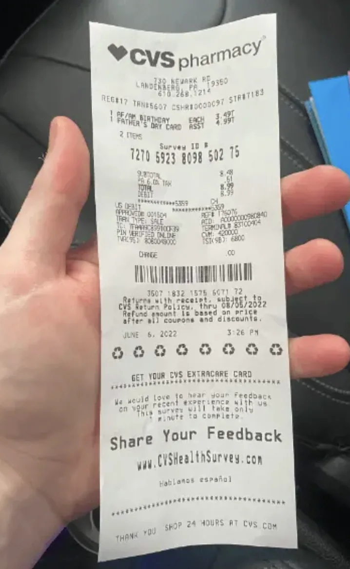 CVS Pharmacy receipt with the 17-digit Survey ID printed above the total and the survey address at the bottom
